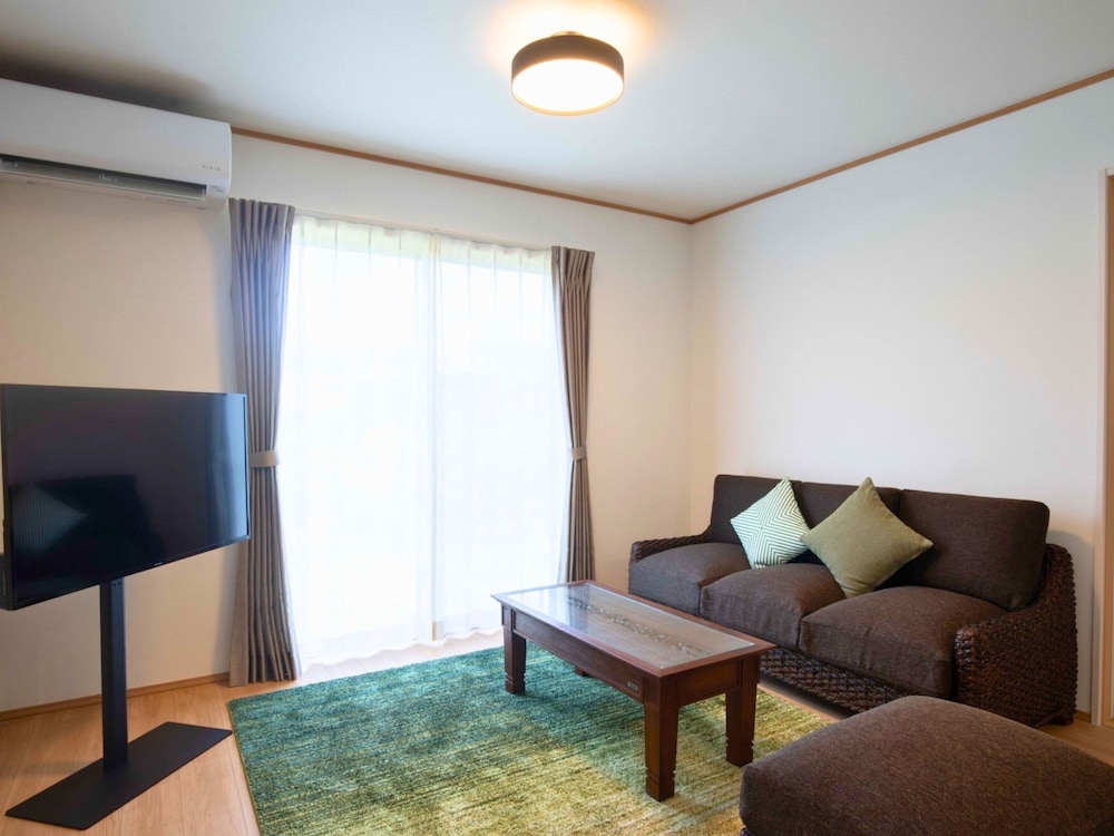 ファミリー アパートメント バルコニー ガーデンビュー 客室16 | Inamine Terrace 