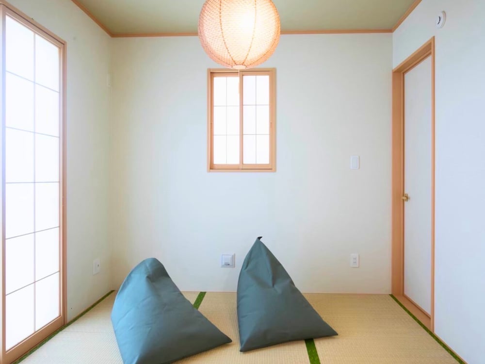 ファミリー アパートメント バルコニー ガーデンビュー 客室1 | Inamine Terrace 