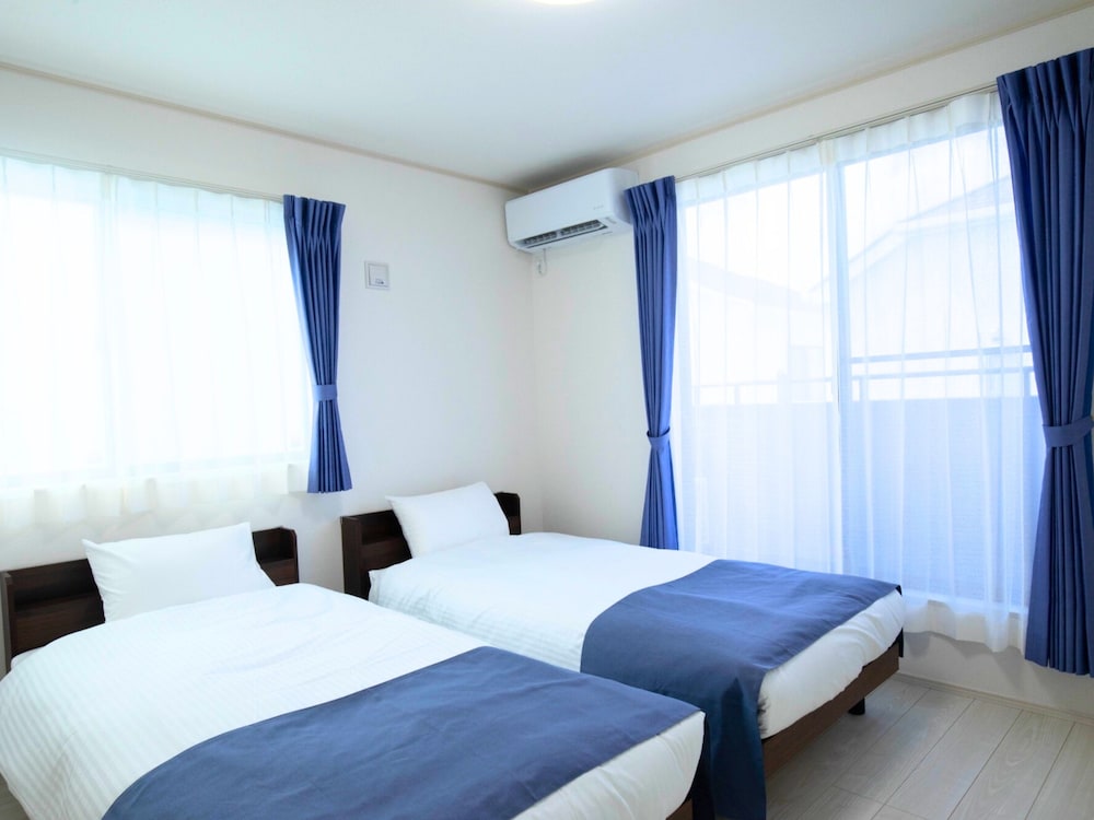 ファミリー アパートメント バルコニー ガーデンビュー 客室14 | Inamine Terrace 