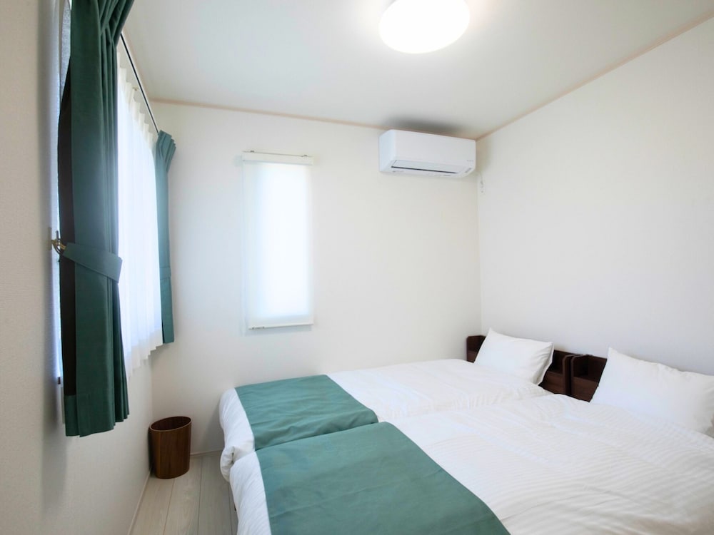 ファミリー アパートメント バルコニー ガーデンビュー 客室10 | Inamine Terrace 