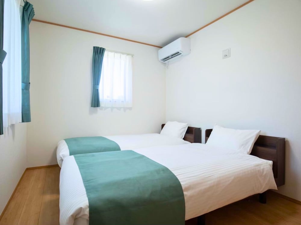 ファミリー アパートメント バルコニー ガーデンビュー 客室9 | Inamine Terrace 