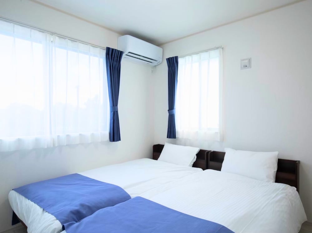 ファミリー アパートメント バルコニー ガーデンビュー 客室11 | Inamine Terrace 