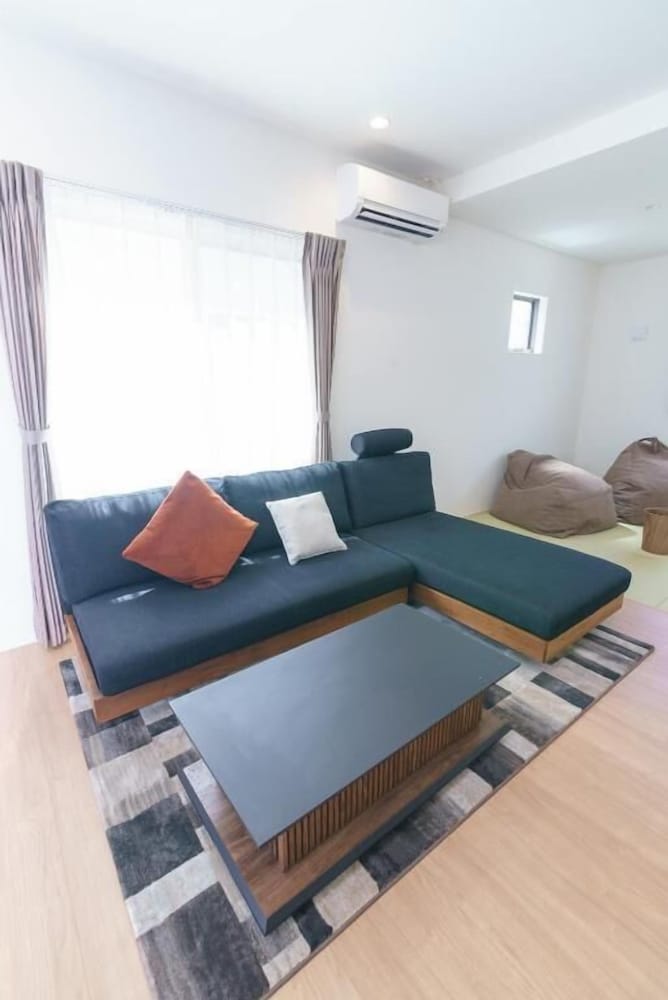 デラックス ヴィラ バルコニー ガーデンビュー リビング エリア1 | Burikina Terrace