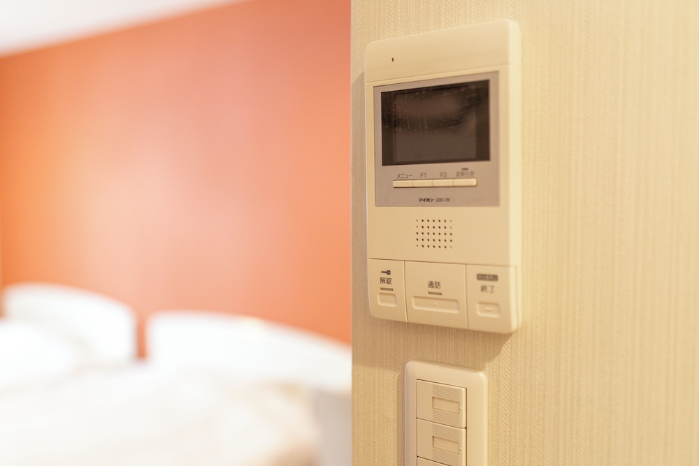 4 人部屋 ラナイ シティビュー 客室25 | 難波民泊