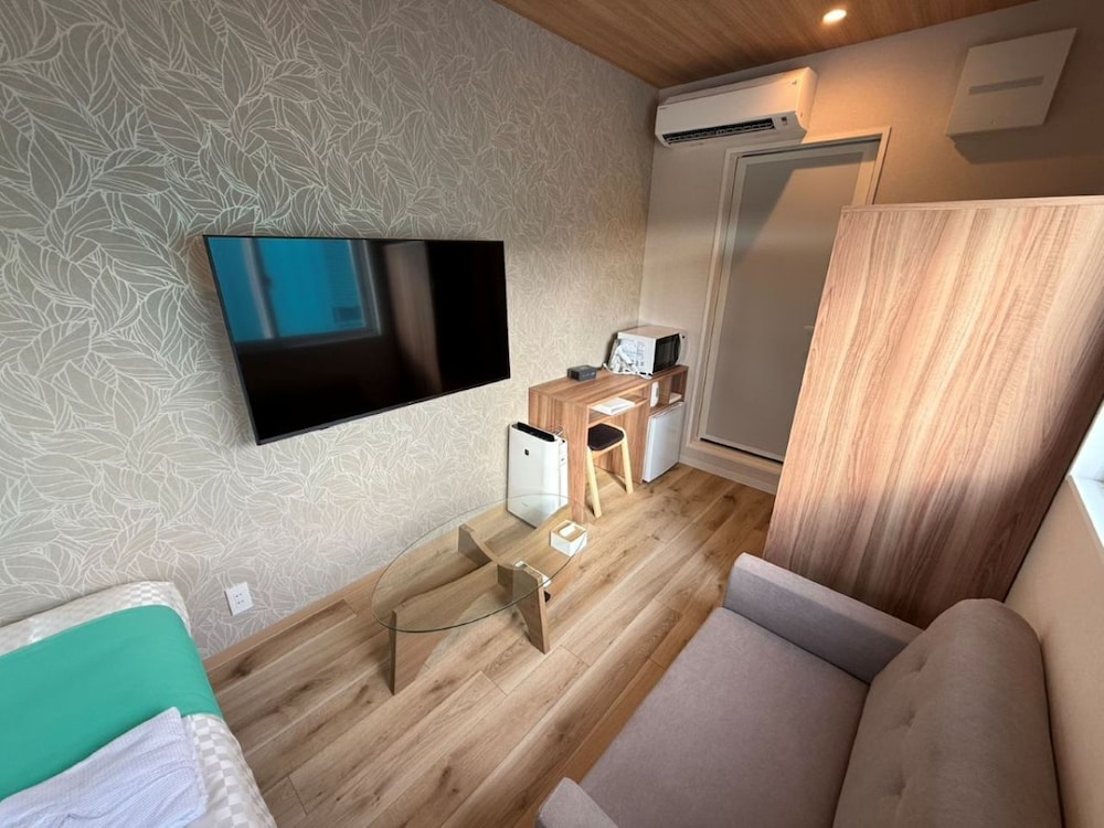 スタンダード シングルルーム 電子レンジ ガーデンビュー 客室1 | MIYAKOJIMA Blue Village HOTEL & SAUNA