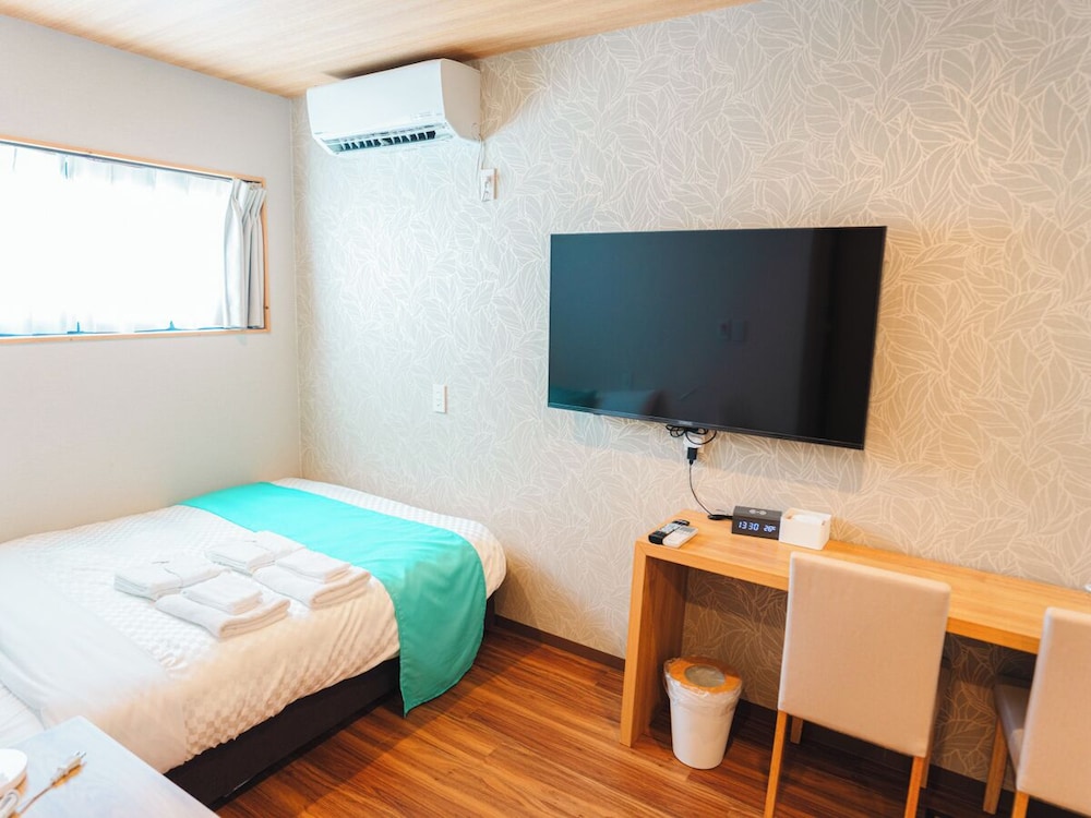 コンフォート ダブルルーム 電子レンジ ガーデンビュー | MIYAKOJIMA Blue Village HOTEL & SAUNA