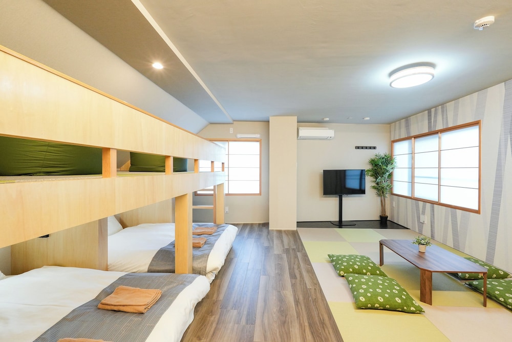 ファミリー アパートメント ベッド (複数台) 車椅子で利用可能な浴槽 キッチン (401) 客室5 | Seed INN Haneda Terrace