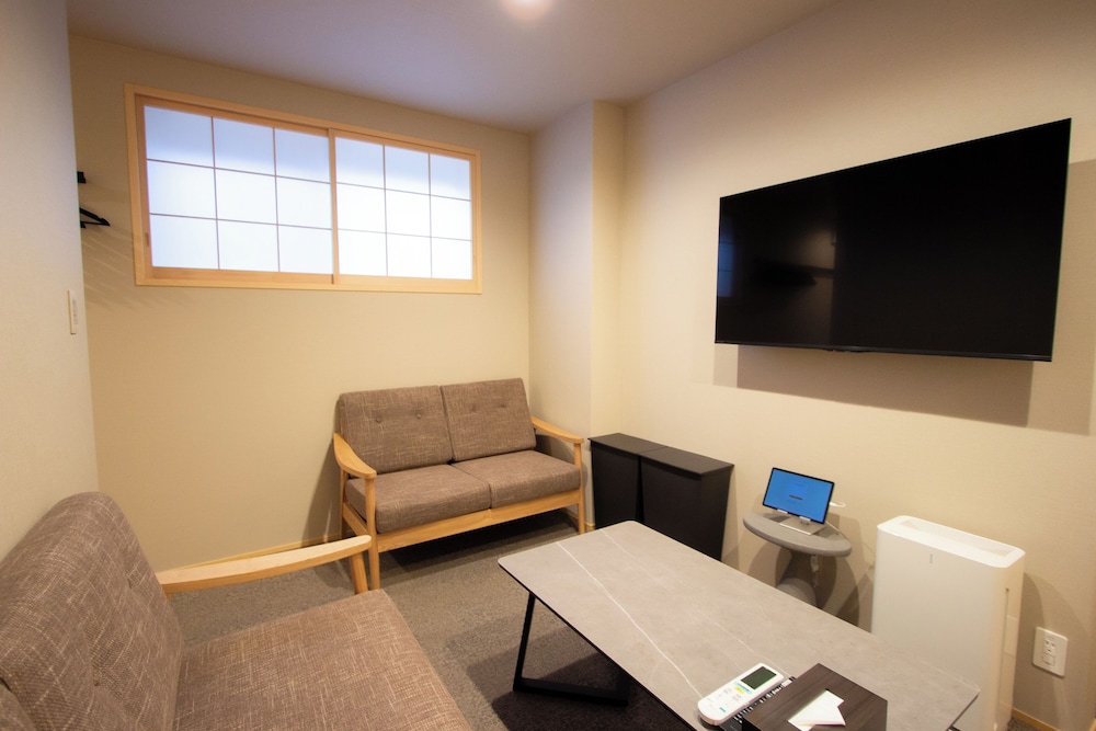 ファミリー スイート リビング エリア0 | Fam Hotel Imaizumi