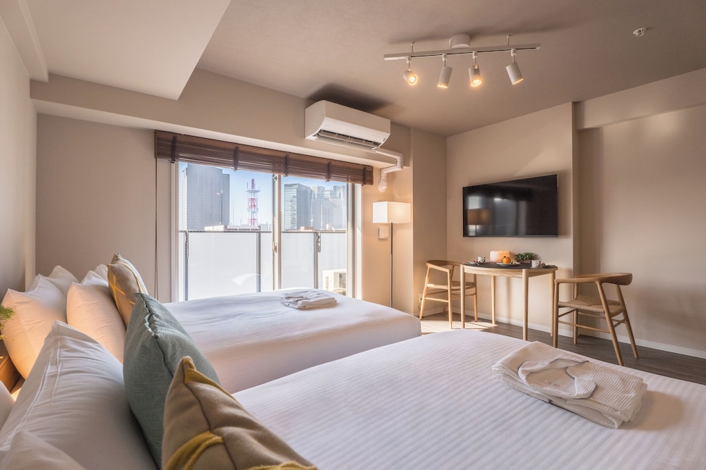 デザイン ツインルーム 2 ベッドルーム バルコニー シティビュー 客室3 | エスリードホテル難波イースト