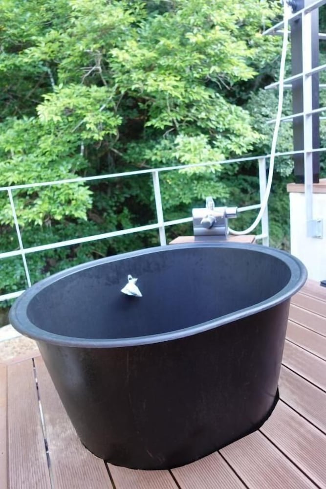 デラックス ツインルーム バルコニー リバービュー 施設の敷地1 | 横川温泉湯殿ととのゆ