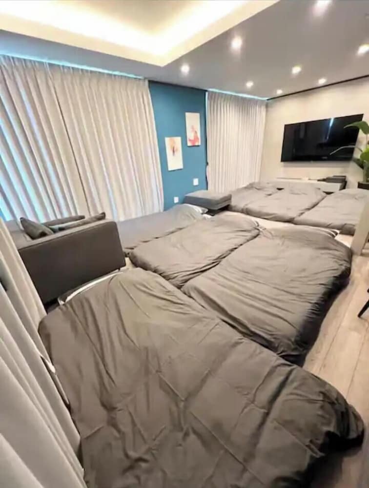 デラックス ヴィラ ガーデンビュー 客室10 | 西伊豆・海沿い庭付き新築ヴィラ｜バレルサウナ源泉掛け流し温泉露天風呂/海まで0秒