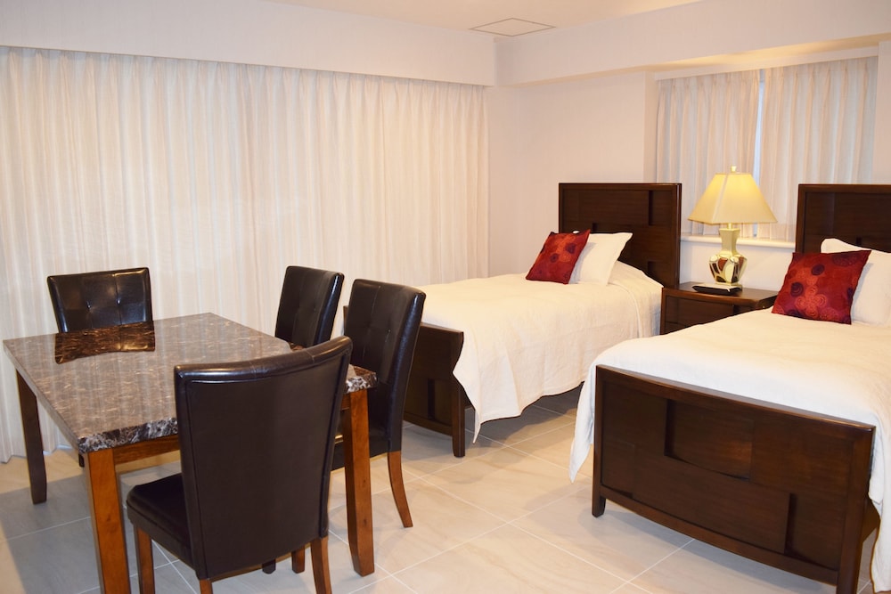 [オーシャンビュー] デラックス4ベッド(3~4名様)55平米 客室1 | ウィステリア コンドミニアム リゾート