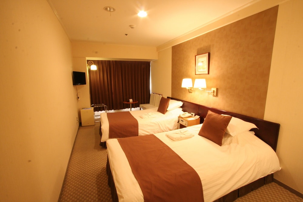 ツインルーム シングルベッド 2 台 禁煙 客室2 | 岡山プラザホテル