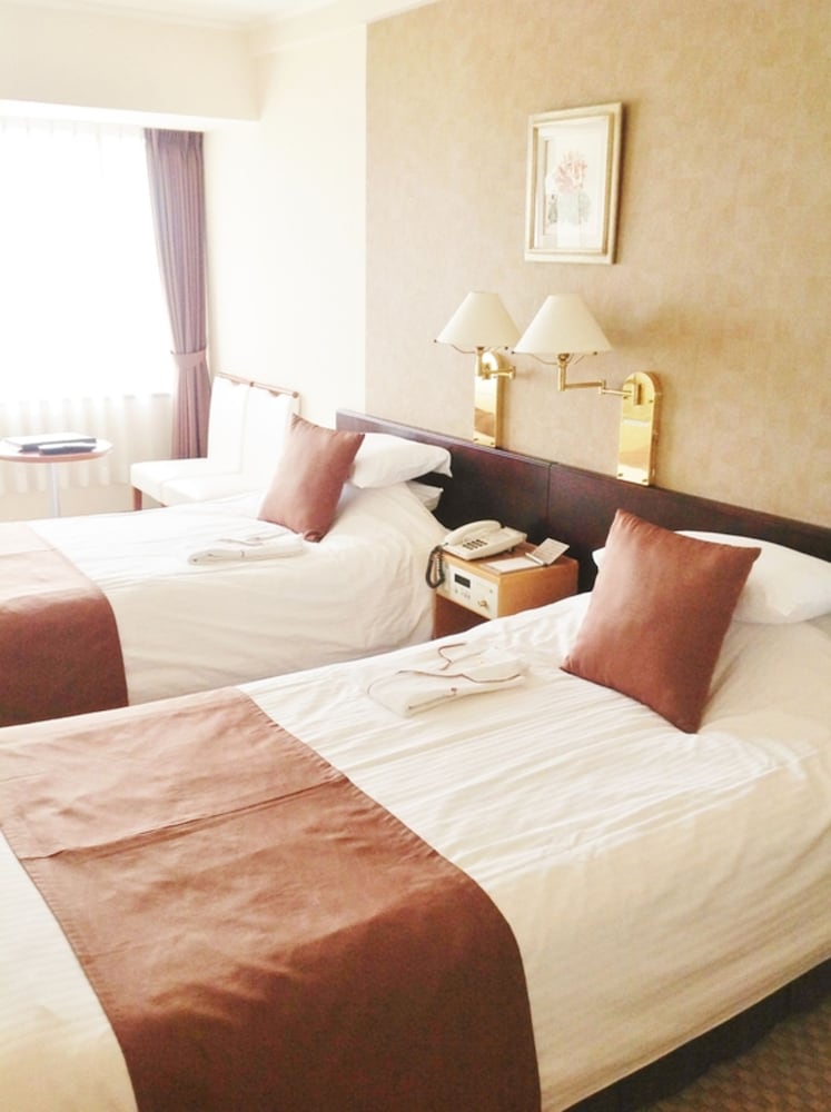 ツインルーム シングルベッド 2 台 禁煙 | 岡山プラザホテル