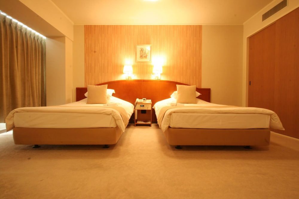 デラックス ツインルーム シングルベッド 2 台 禁煙 客室5 | 岡山プラザホテル