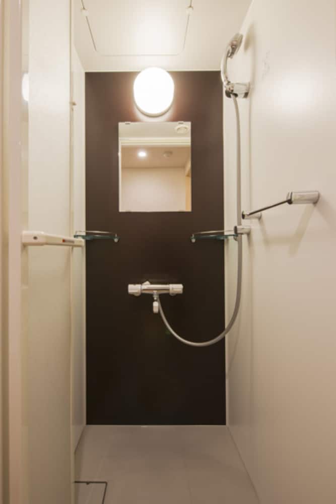 モデレートダブルルーム 禁煙 バスルームのシャワー0 | 天然温泉　境港　夕凪の湯　御宿　野乃（ドーミーインチェーン）