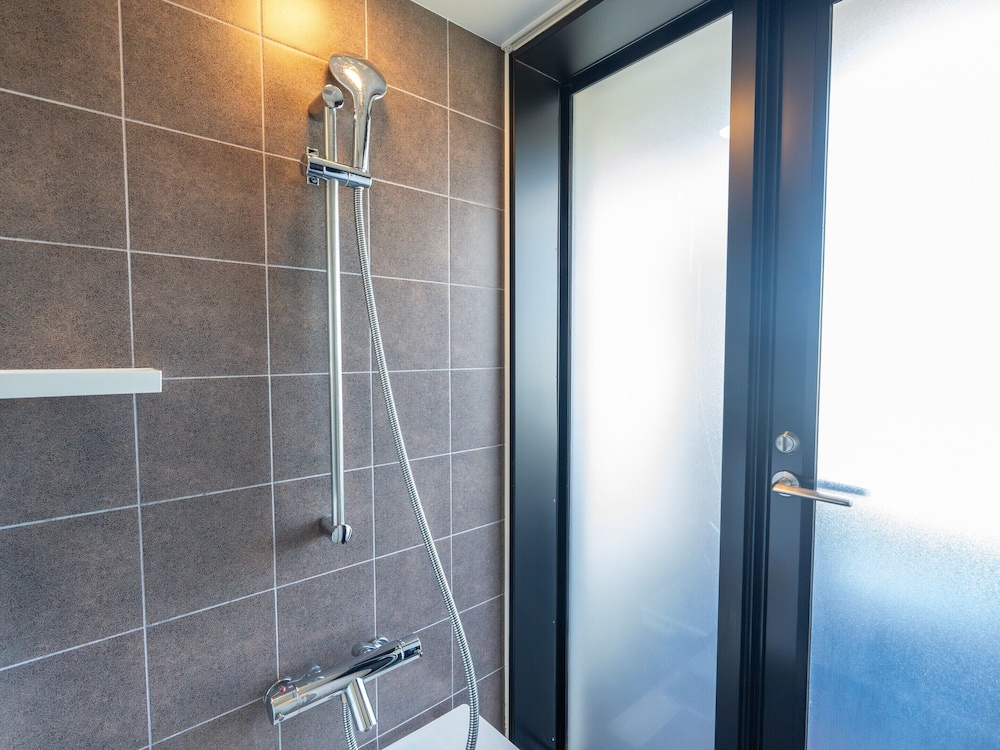 温泉露天風呂付/デラックス和洋室/エアポートビュー 客室6 | 琉球温泉瀬長島ホテル