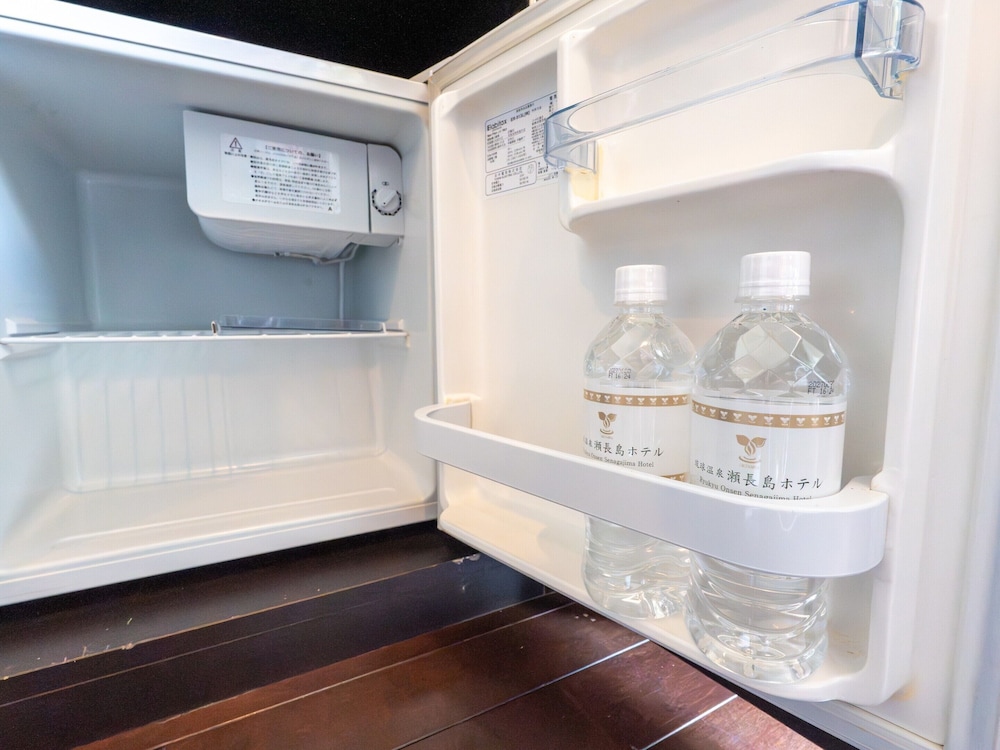 温泉露天風呂付/デラックス和洋室/エアポートビュー 客室4 | 琉球温泉瀬長島ホテル