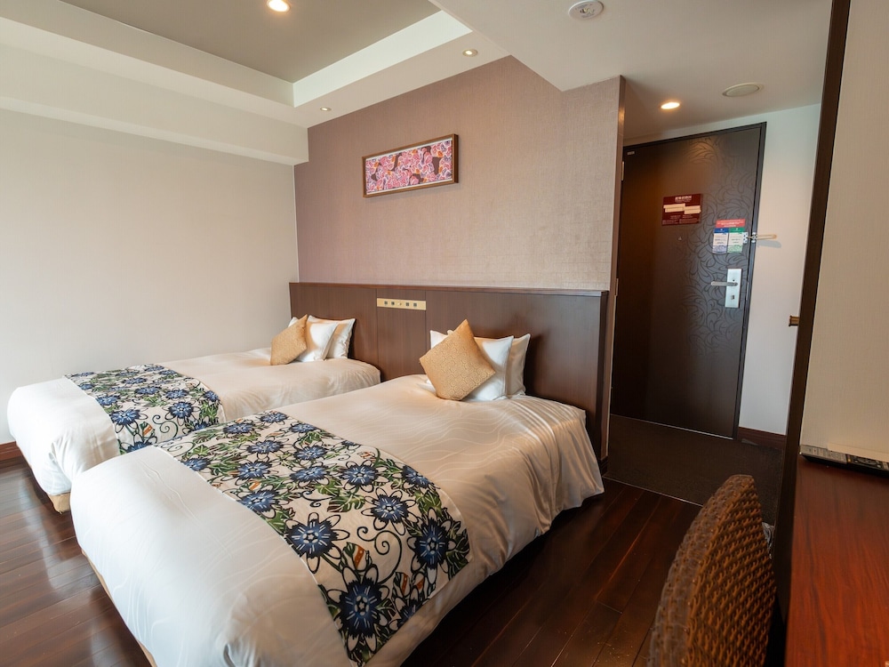 温泉露天風呂付/和洋室/オーシャンビュー 客室7 | 琉球温泉瀬長島ホテル