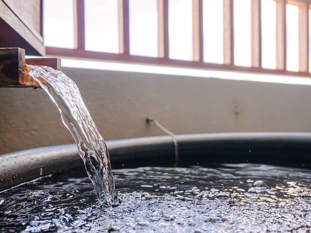 温泉露天風呂付/デラックス和洋室/エアポートビュー 客室1 | 琉球温泉瀬長島ホテル