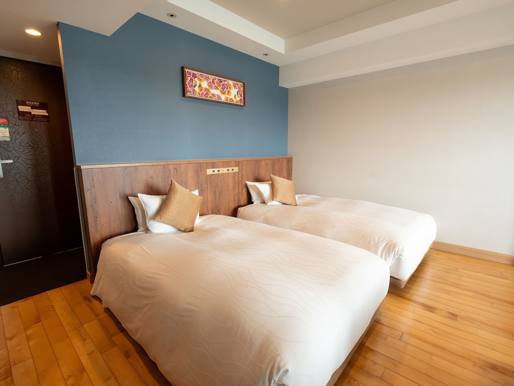 スタンダードツイン/エアポートビュー 客室8 | 琉球温泉瀬長島ホテル