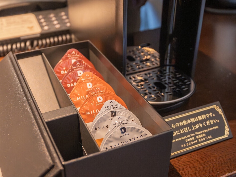 温泉露天風呂付/デラックス和洋室/エアポートビュー 客室19 | 琉球温泉瀬長島ホテル