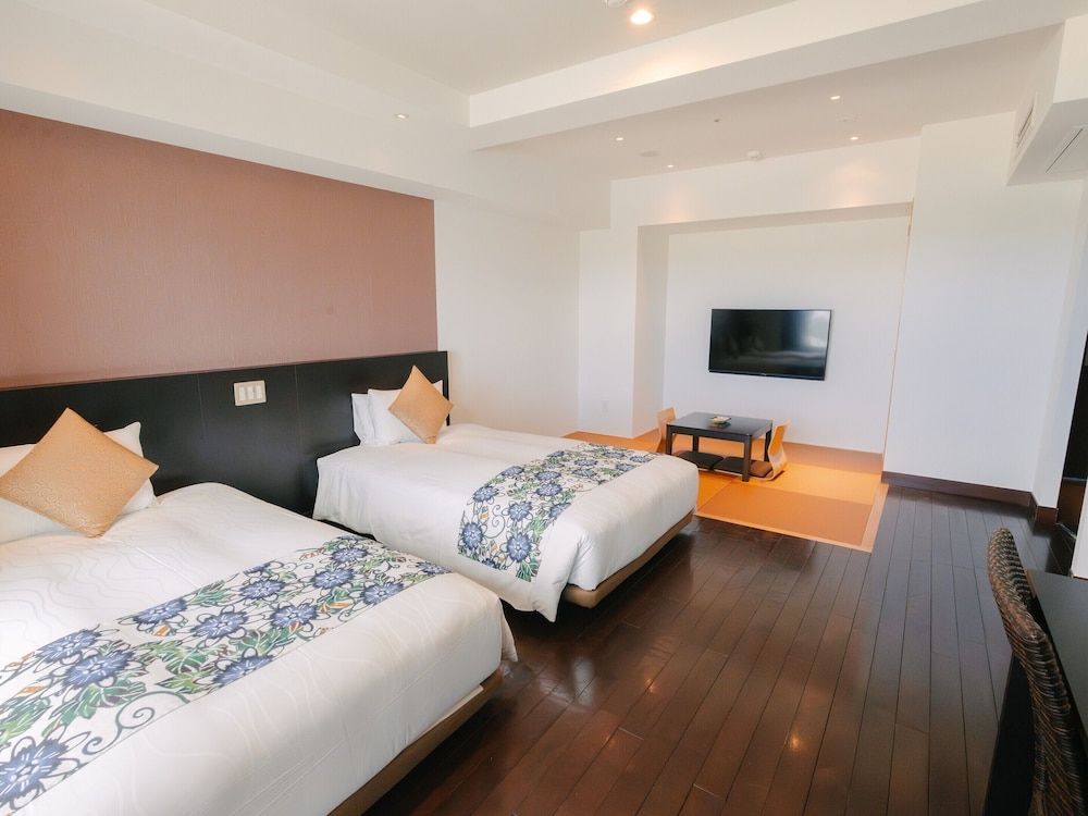 温泉露天風呂付/デラックス和洋室/エアポートビュー 客室14 | 琉球温泉瀬長島ホテル