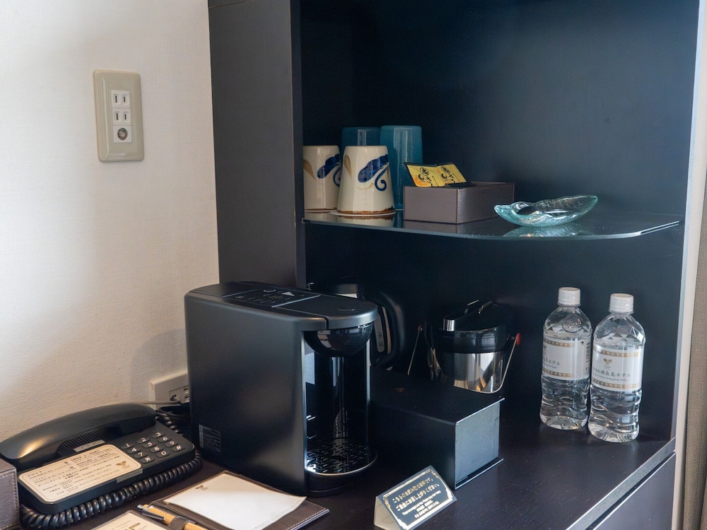 温泉露天風呂付/デラックス和洋室/エアポートビュー 客室20 | 琉球温泉瀬長島ホテル