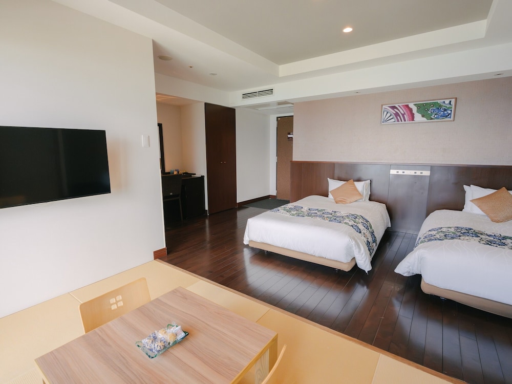 温泉露天風呂付/デラックス和洋室/オーシャンビュー 客室1 | 琉球温泉瀬長島ホテル