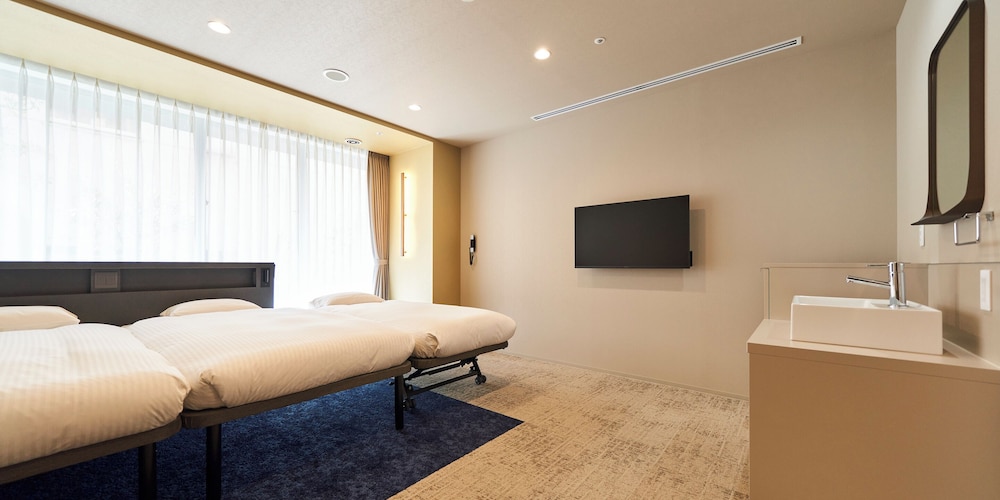 [禁煙]エグゼクティブトリプルルーム | プリンセスガーデンホテル