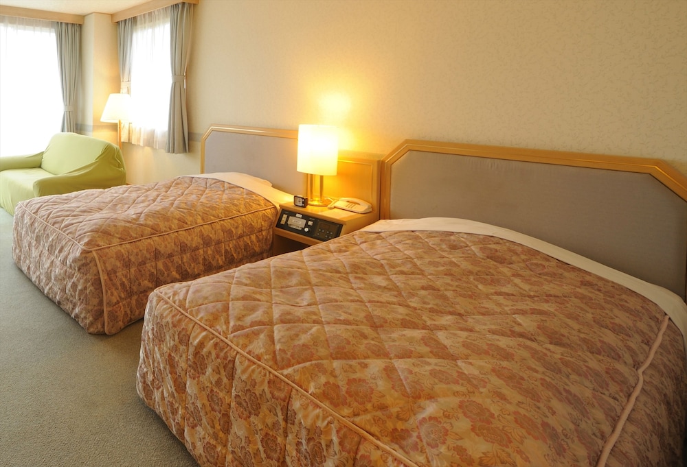 洋室ツインルーム 山側 客室2 | 由布院 ことぶき 花の庄