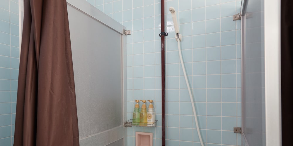 スタンダード ツインルーム 共用バスルーム オーシャンビュー 1階 禁煙 共用バスルーム0 | ホテルオーシャンズ今帰仁