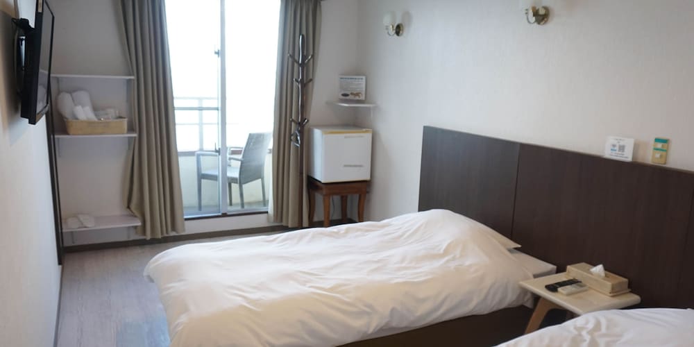 デラックス ツインルーム 専用バスルーム オーシャンビュー 2階 禁煙 | ホテルオーシャンズ今帰仁