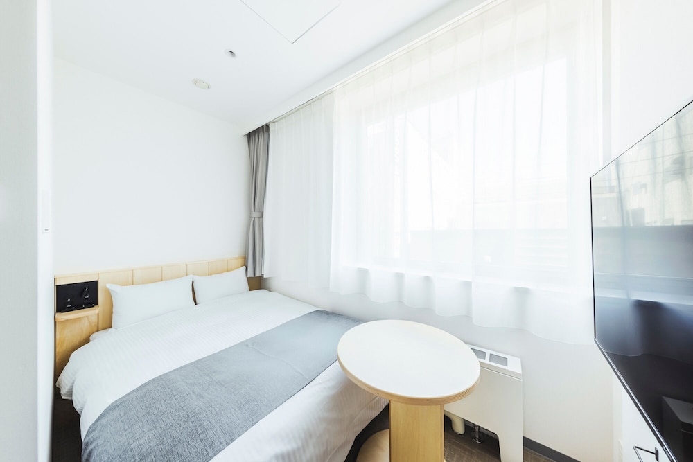 エコノミー ダブルルーム セミダブルベッド 1 台 禁煙 浴槽 | HOTEL NUPKA (ホテルヌプカ)