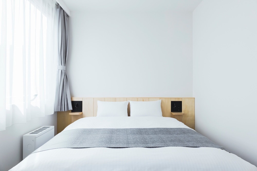 スーペリア ダブルルーム クイーンベッド 1 台 禁煙 専用バスルーム 客室4 | HOTEL NUPKA (ホテルヌプカ)