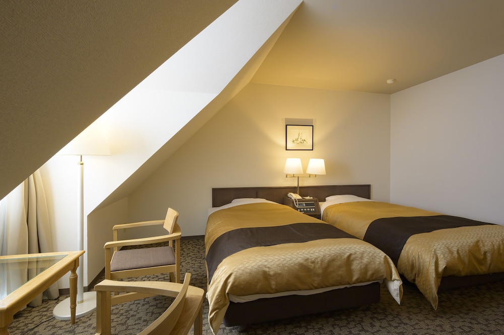 スタンダード ツインルーム 禁煙 客室1 | 富良野リゾートホテル エーデルヴェルメ