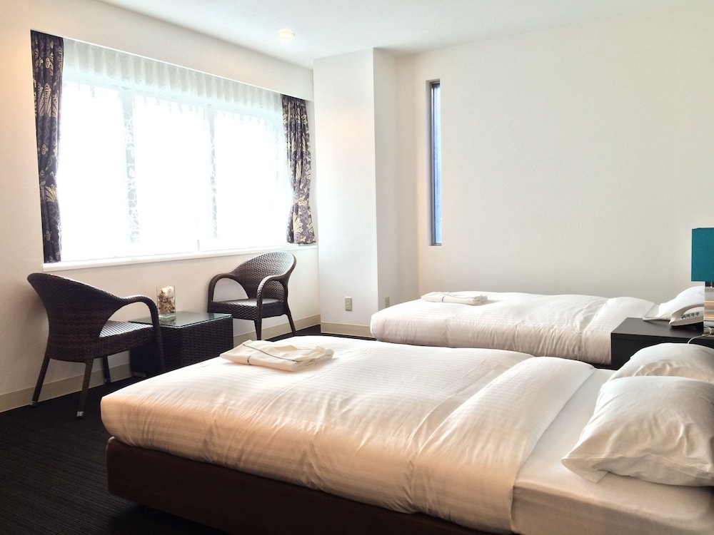 デラックス ツインルーム シティビュー 客室1 | ライベストイン奄美