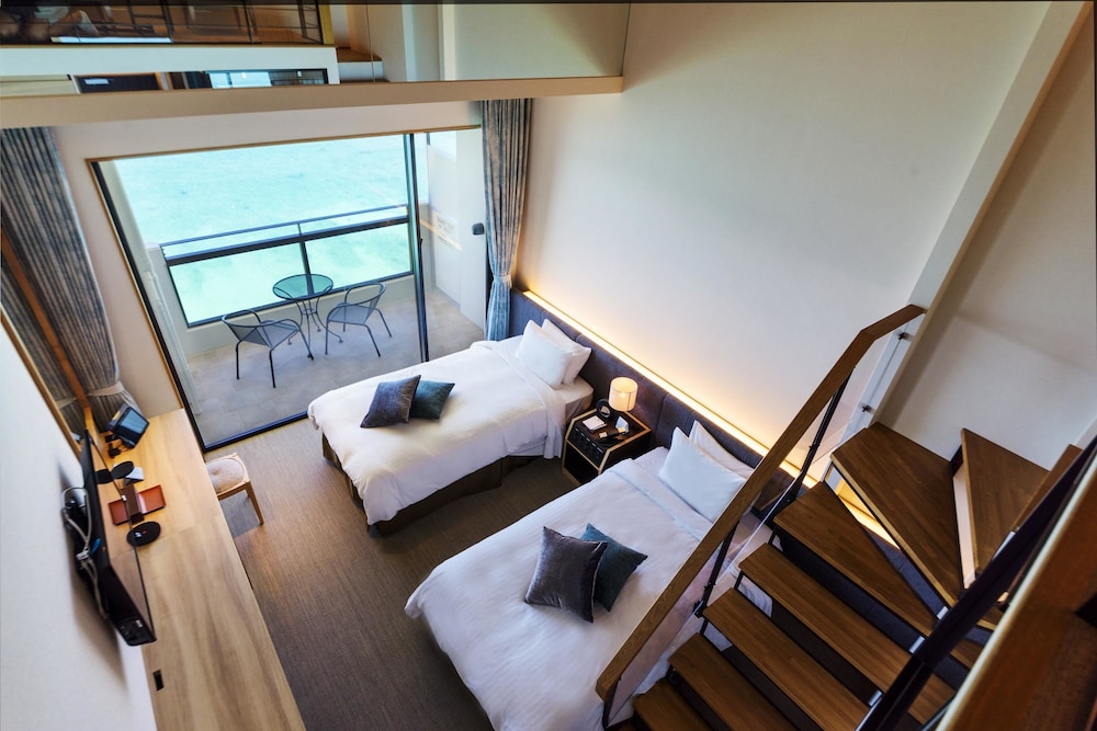 エグゼクティブ ロフト シングルベッド 2 台 禁煙 オーシャンフロント (with Extra Bed) 客室2 | ベストウェスタン沖縄幸喜ビーチ