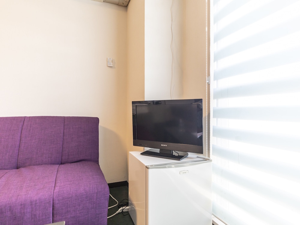 ツインルーム シングルベッド 2 台 共用バスルーム オーシャンビュー 客室10 | おもてなしホステル 宮島