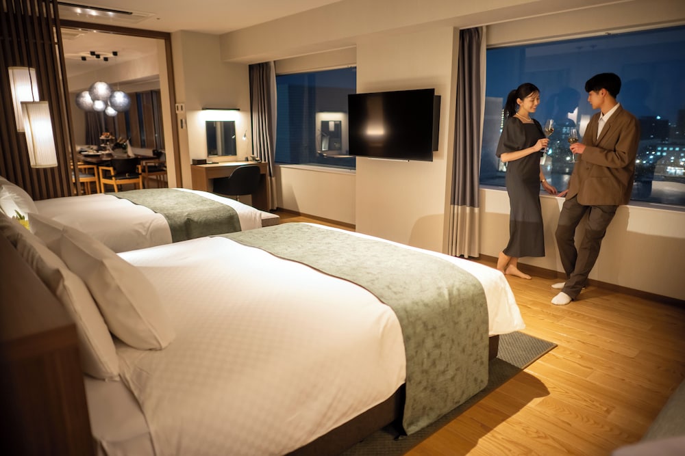グランド スイート ベッド (複数台) 禁煙 リバービュー 客室3 | 新潟グランドホテル