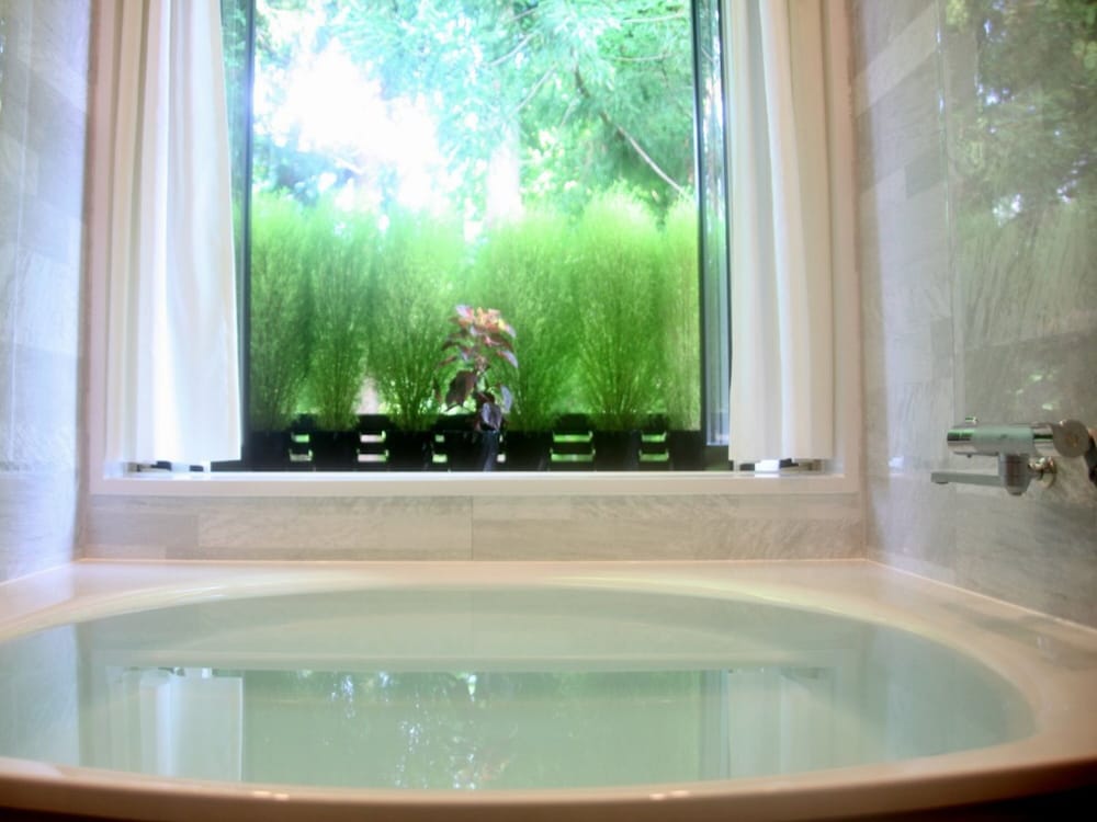 エグゼクティブ スイート ダブルベッド 2 台 禁煙 バスルーム0 | レストラン＆ホテル トロイメライ