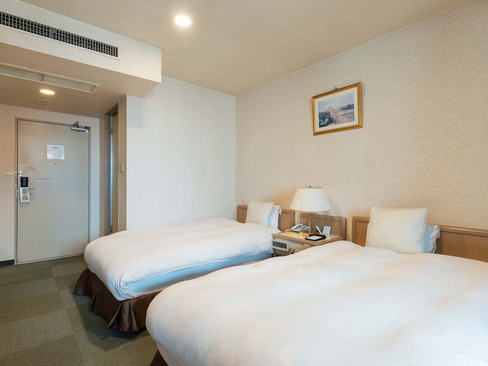 ツインルーム 禁煙 (バルコニーでのみ喫煙可) 客室1 | ホテル ニューセンチュリー