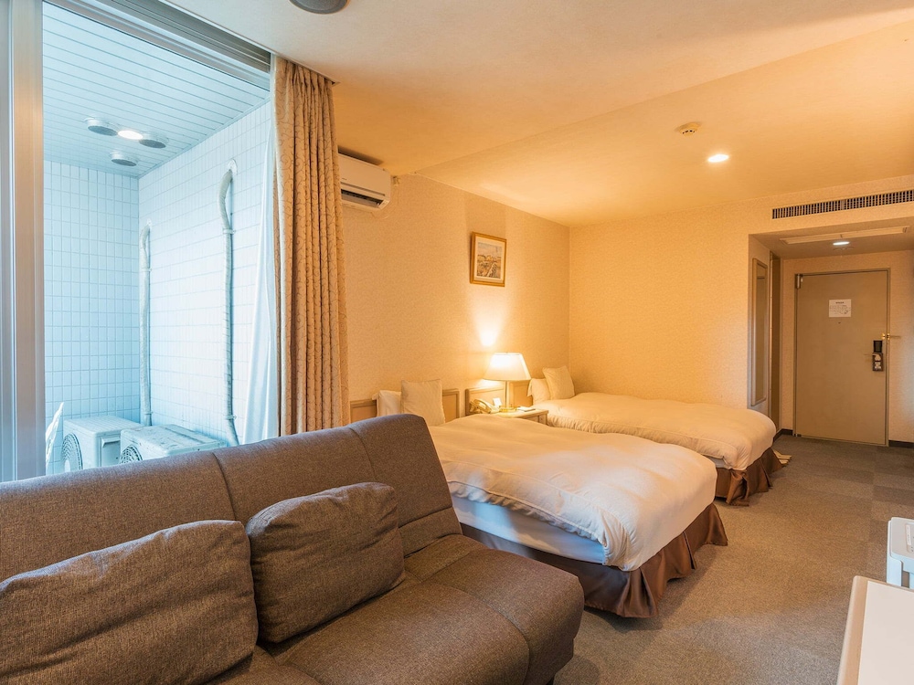 デラックス ツインルーム 禁煙(バルコニーでのみ喫煙可) 客室3 | ホテル ニューセンチュリー