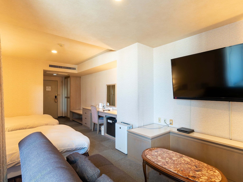 デラックス ツインルーム 禁煙(バルコニーでのみ喫煙可) 客室4 | ホテル ニューセンチュリー