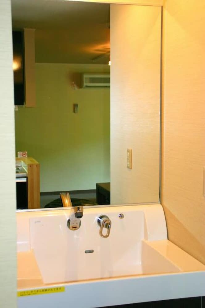 客室温泉露天風呂付コンドミニアム　（４名定員）　禁煙　山側 バスルームのシンク2 | ウィンケルビレッジ