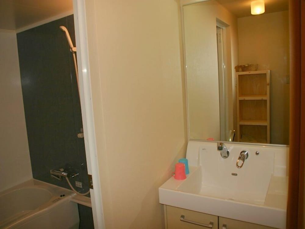 客室温泉露天風呂付コンドミニアム　（４名定員）　禁煙　山側 バスルームのシンク4 | ウィンケルビレッジ