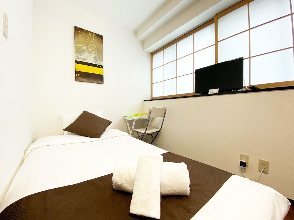 ツインルーム 専用バスルーム付 (303) 客室2 | おうちホテル横川