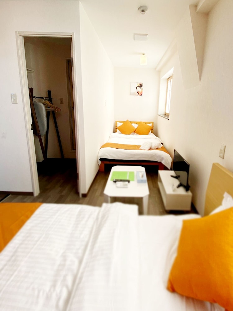 ラージツインルーム 専用バスルーム付 (502) 客室3 | おうちホテル横川