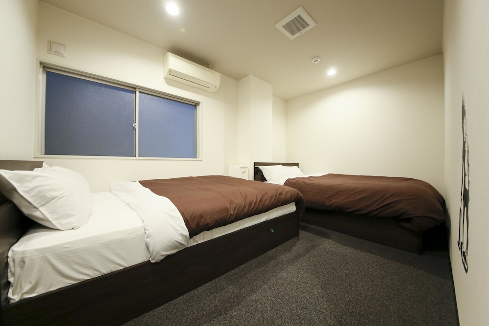 ファミリールーム（ダブルベッドタイプ）禁煙 客室2 | Roots Hostel