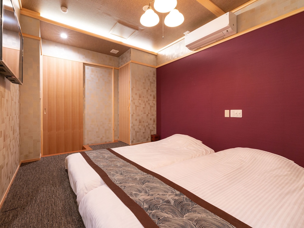 新 半露天風呂付客室赤岳 ･ (禁煙ルーム) 客室4 | 銘庭の宿 ホテル甲子園